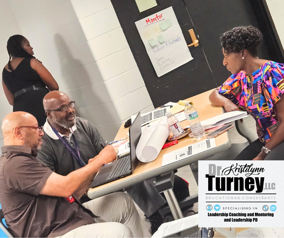 Dr. Turney sits and coaches during training event.